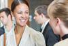 smiling-solicitors-talking-at-networking-event-530686149