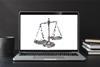 scales-justice-pixellated-online-courts-laptop-600x400