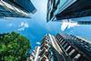Image looking up at buildings against the sky