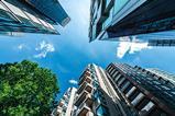 Image looking up at buildings against the sky