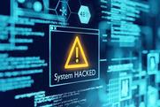 An error message reads 'system hacked' following a cyber attack