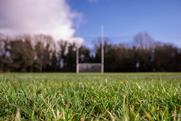 rugby pitch goal posts in focus social