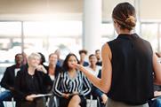woman-stood-in-front-of-crowd