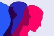 Three overlapping silhouettes of human profiles in different colors: blue, purple, and red. The profiles are facing to the right and are layered on top of each other, creating a gradient effect where they overlap