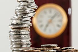 pile of coins clock