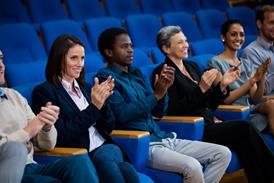 business-executives-applauding-business-meeting