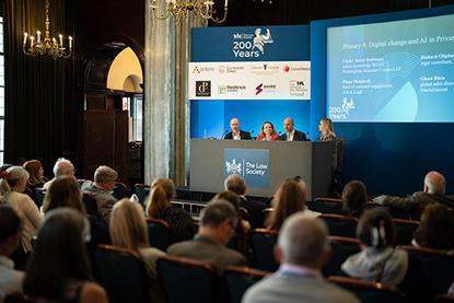 Four panel speakers at Private Client Annual Conference speak to an audience