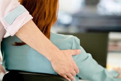 male-office-worker-touching-female-colleague-shoulder-harassment