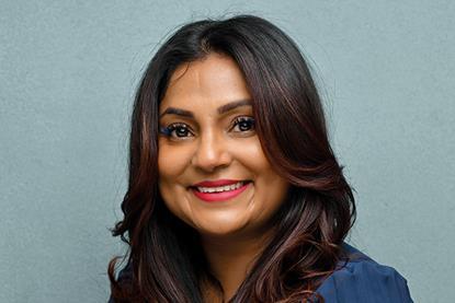 Headshot of Mitra Mann