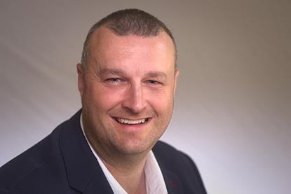 Headshot of Tim Kidd