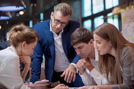 colleagues-discussing-decision-making-1412797997