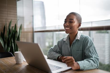 smiling-woman-working-from-home-1313460653