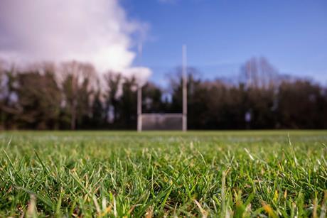 rugby pitch goal posts in focus social