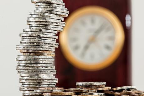 pile of coins clock
