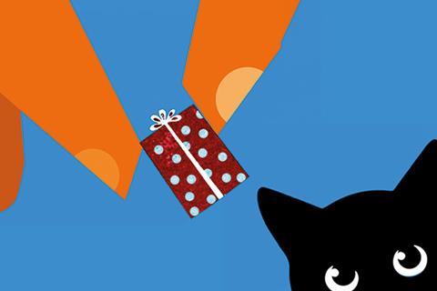 Gift being presented to a cat