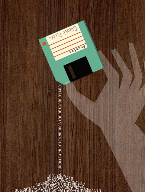 person holding floppy disk