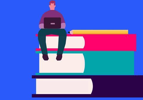 A person sitting on top of a stack of three large books, using a laptop. There is also a pencil placed horizontally across the top book. The background is blue, and the books are red, teal and purple, from top to bottom